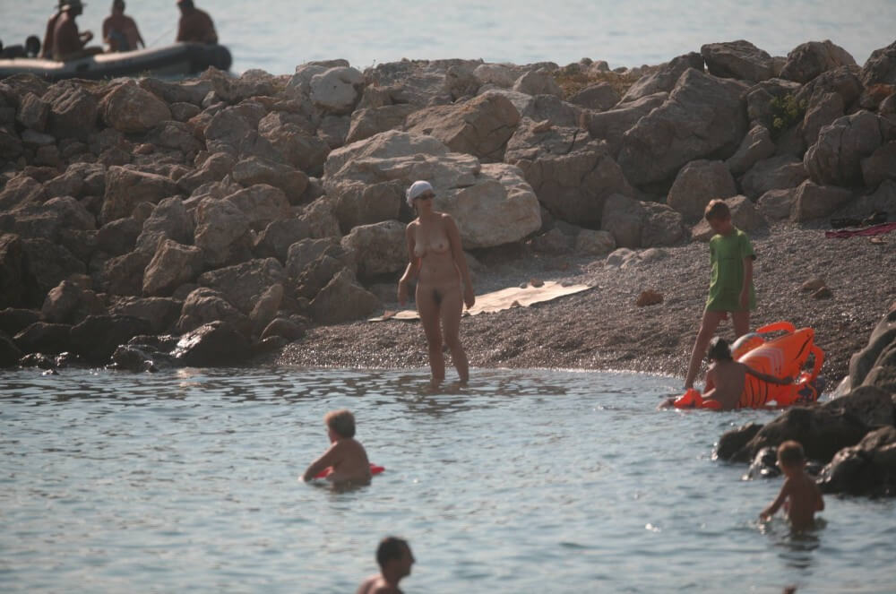 FKK cove pyramid in waters - Nudism fosters trust and mutual understanding