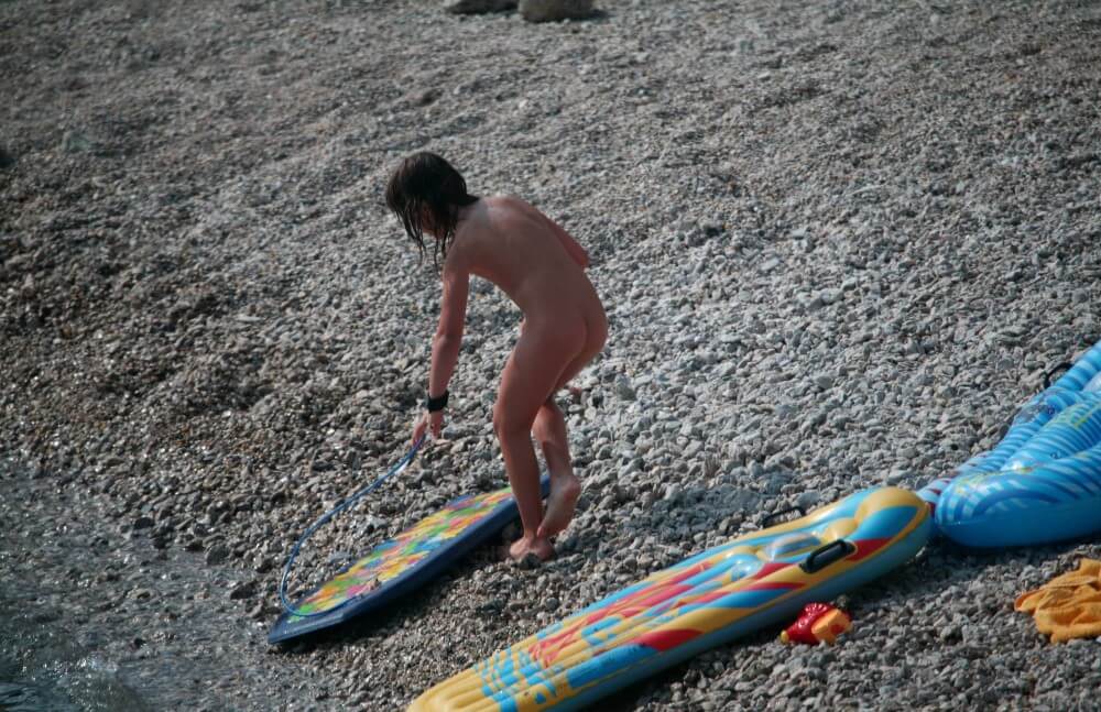 Naturist Surf Board Glides pics - The practice of nudism helps overcome insecurities and overcome fears