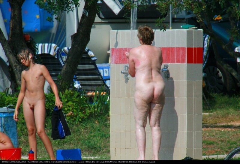 Covered in Towel Nudists-Boardwalk Biking - Many naturists are members of Green parties or various environmental movements