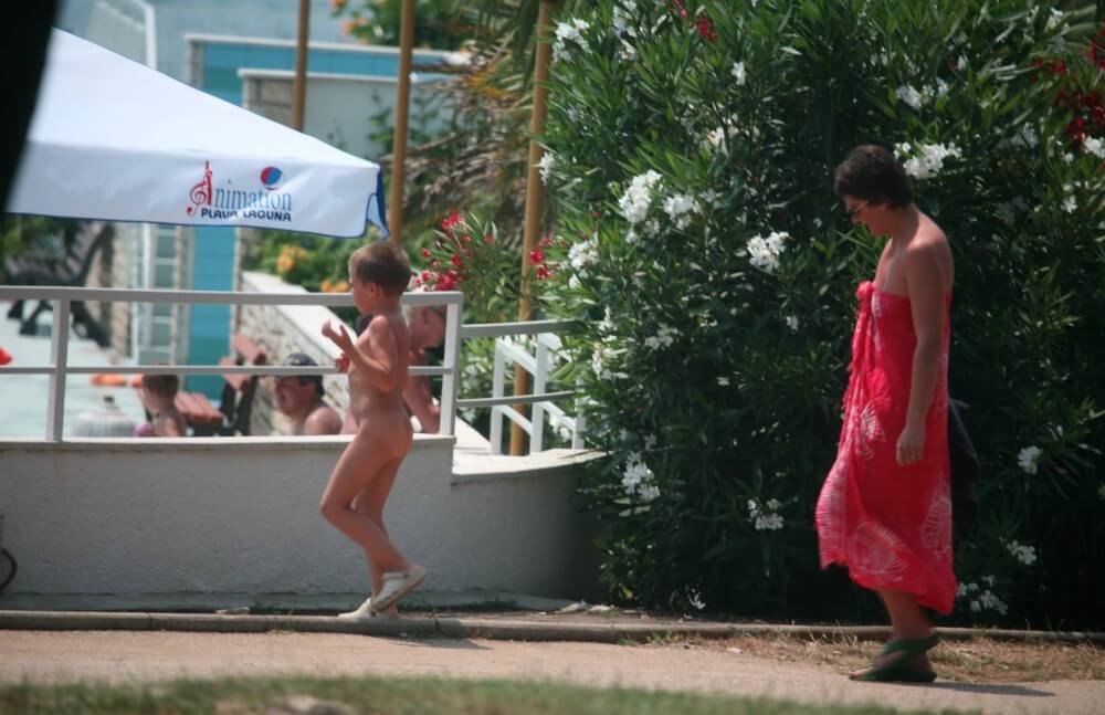 Naturist Pool Walkaround pics - In nudism, people are equal to one another