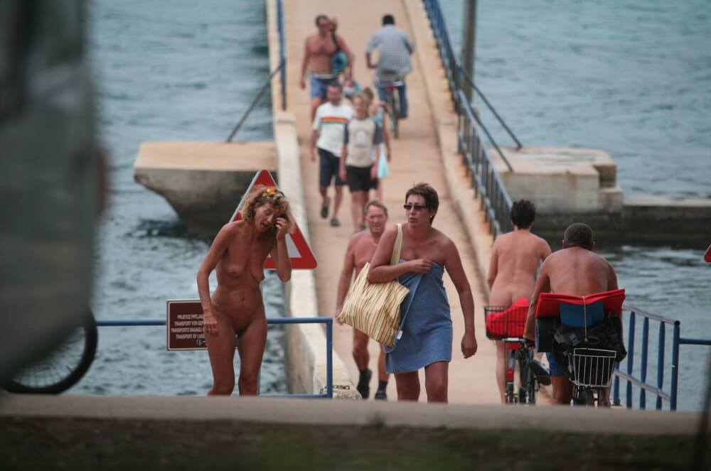 Crete FKK Bridge Crossing photos - Family nudism in its cultural context