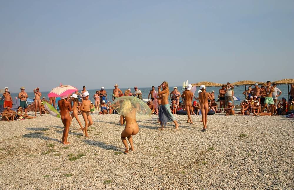 Ribbon and Umbrella Dance pics - Openness to the world and new ideas is an important quality of naturists