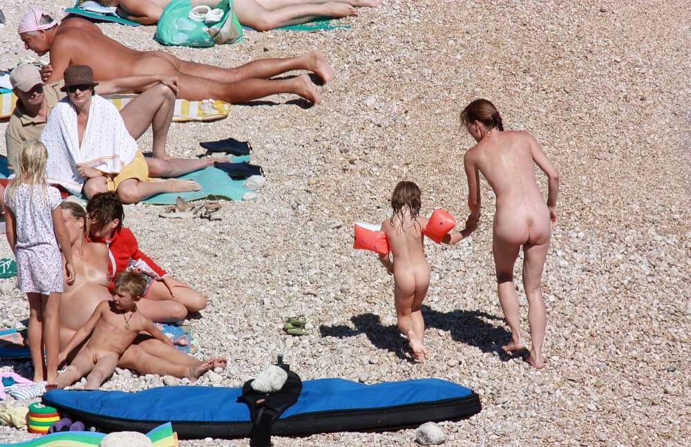 Orange Floaty Safety First Naturist pics - Naturism as a protest against puritanical moral norms