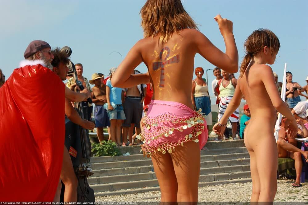 Colorful Carnival Dancing photos - Watching naked nudists